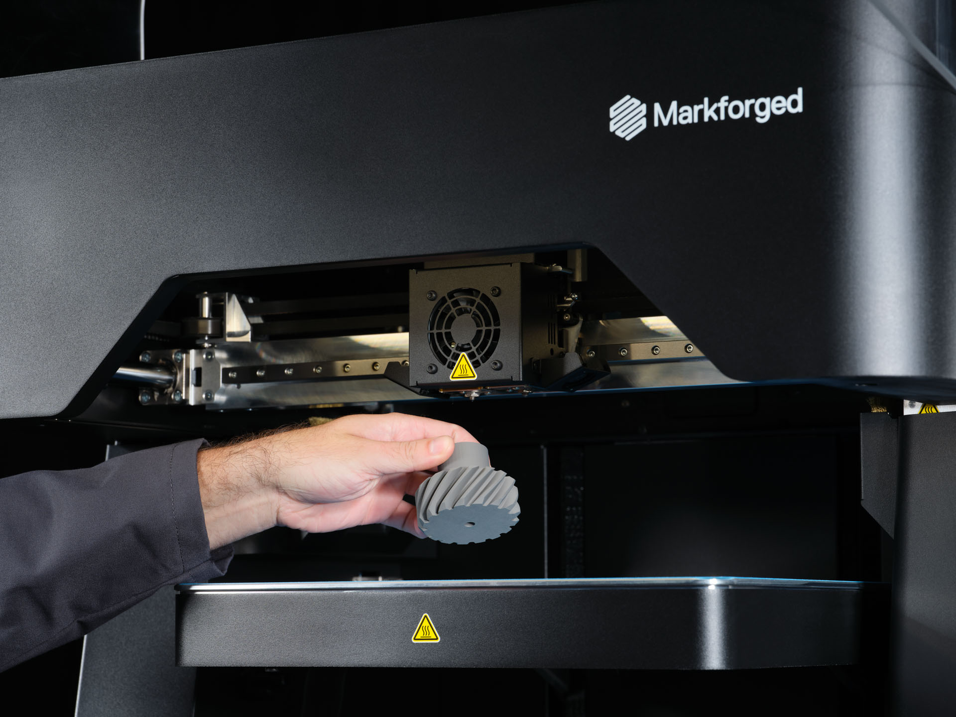 FX10 Picking Up Metal Part Medium